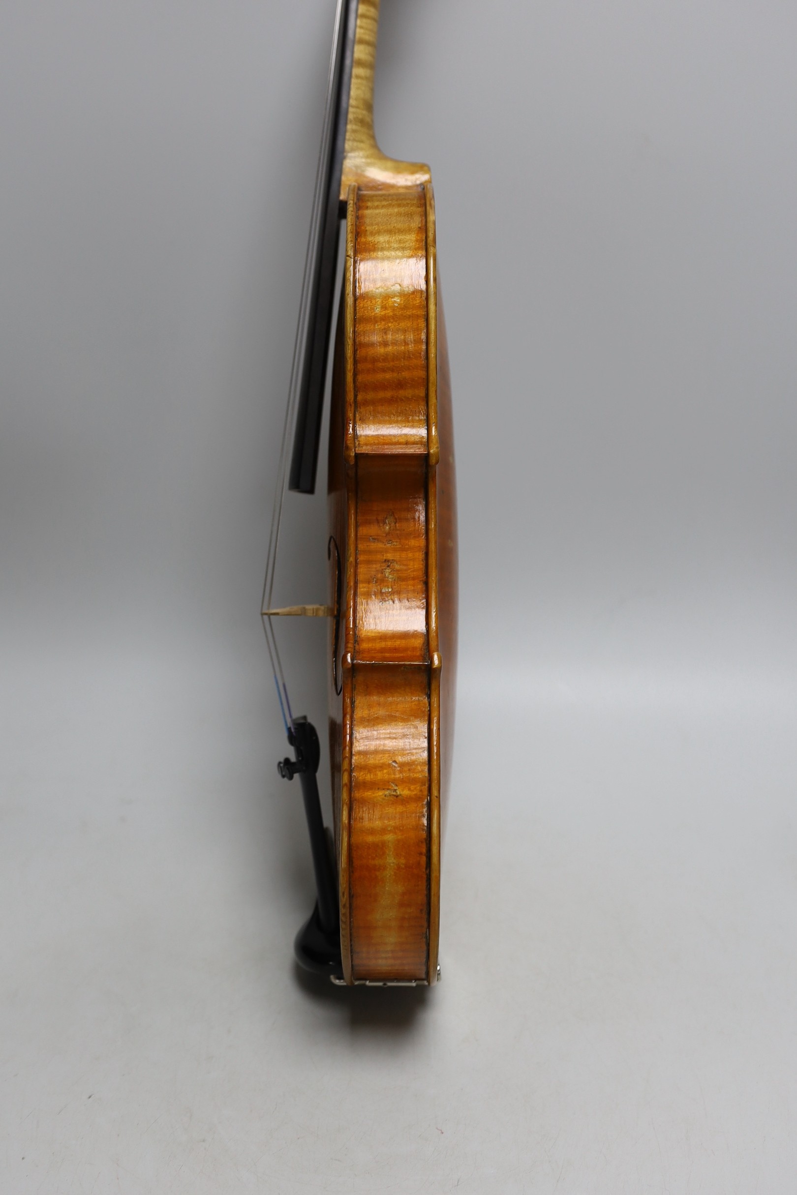 A cased violin, sound post loose